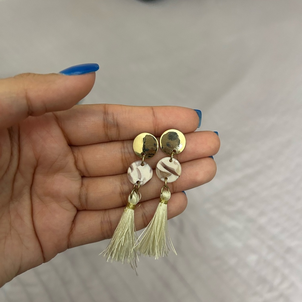 Elegant Gold and Cream Tassel Earrings